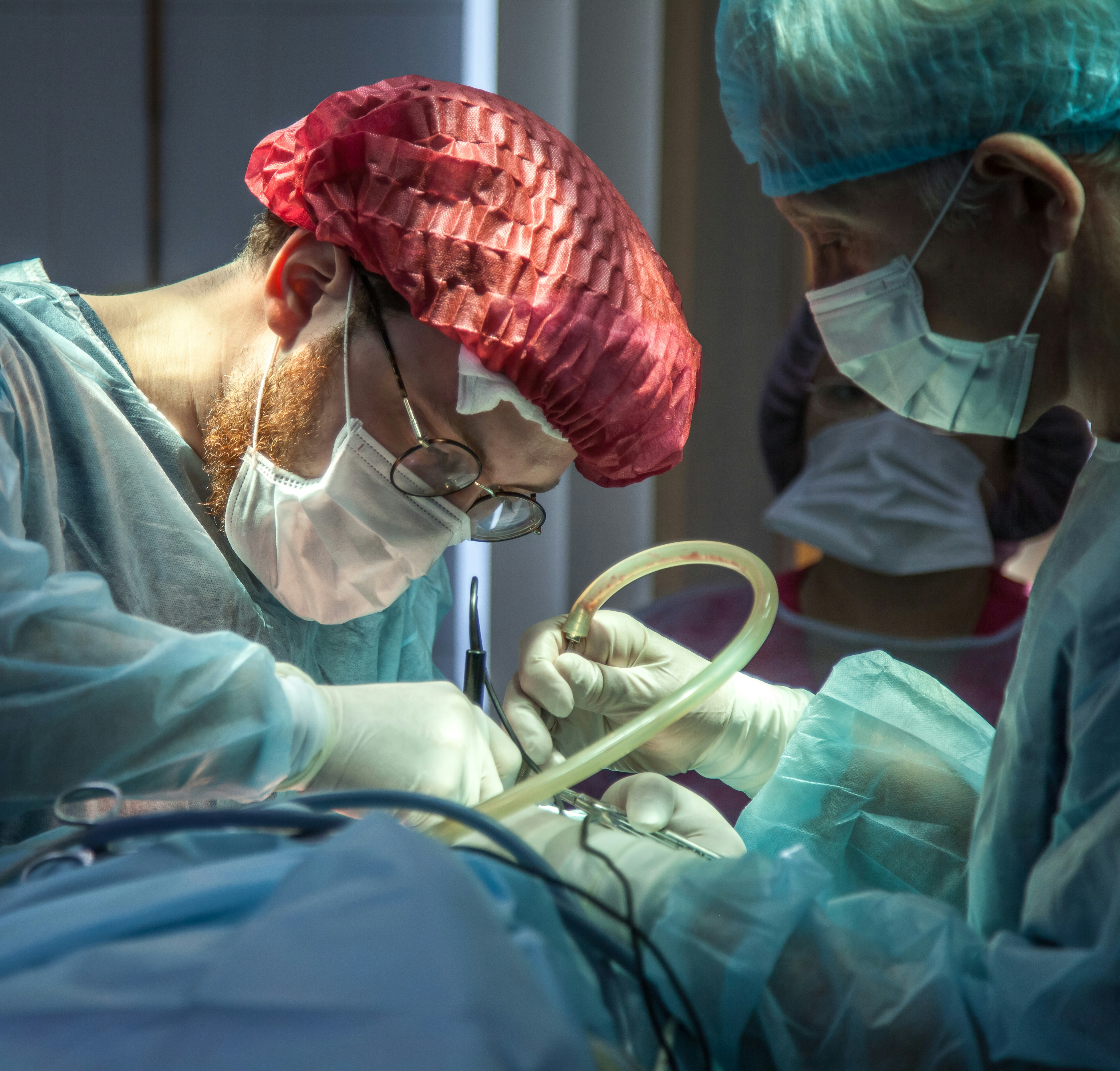 Surgeon performing orthopedic joint replacement procedure