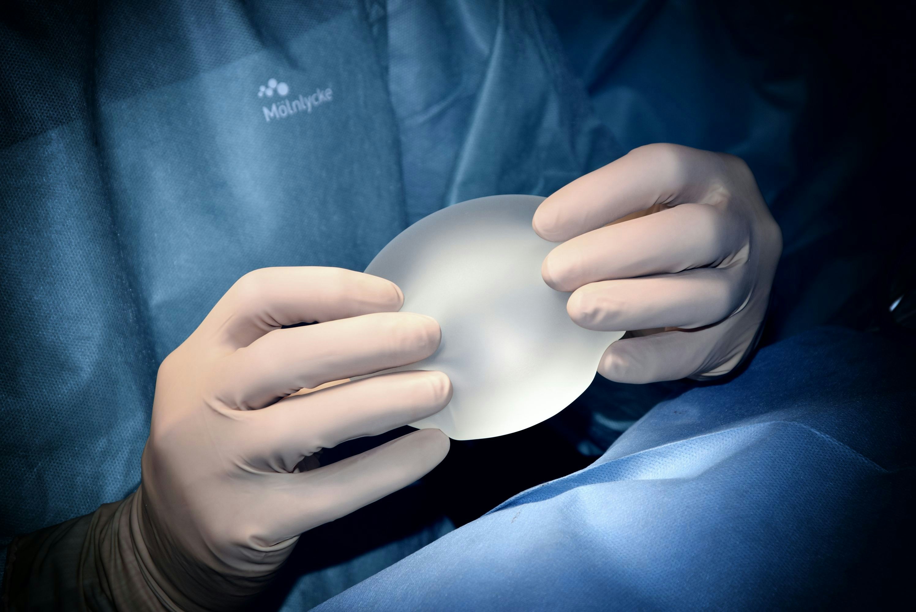 Patient consulting plastic surgeon about breast augmentation abroad